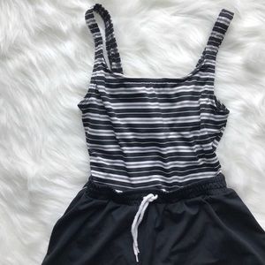 90s vintage swimsuit with shorts attached.